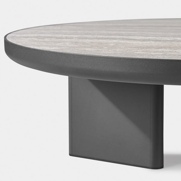 Moab Round Coffee Table | Aluminum Bronze, Travertine Dark Grey,